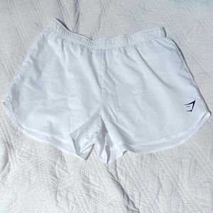 White gymshark essential loose training shorts